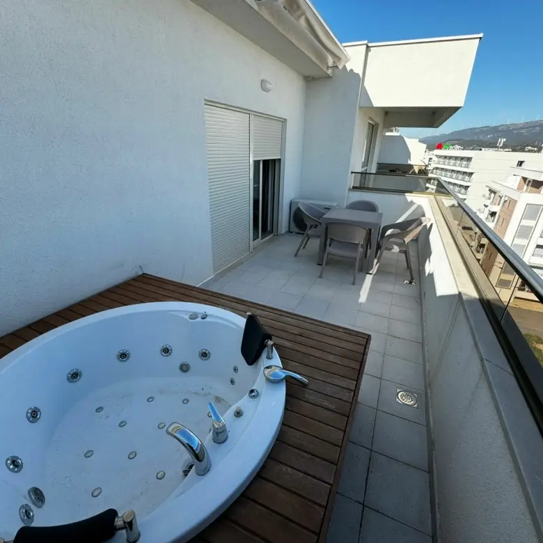 Stunning Ulcinj rooftop with jacuzzi, wooden deck, and city views&mdash;ideal Montenegro investment, exclusive at immorenta.me by ekosphere doo.