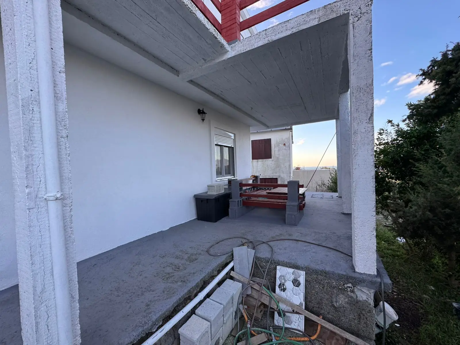 Spacious Ulcinj patio with scenic water and tree views, ideal for investing in Montenegro real estate by Ekosphere at immorenta.me.