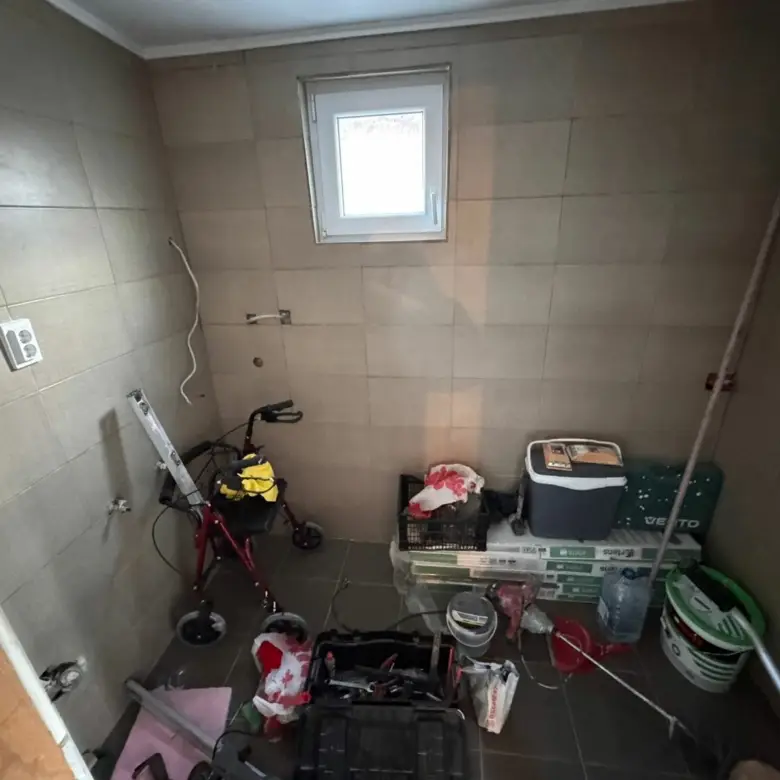 Renovation opportunity in Ulcinj, Montenegro: tiled room with window, tools; prime investment via immorenta.me by Ekosphere DOO.