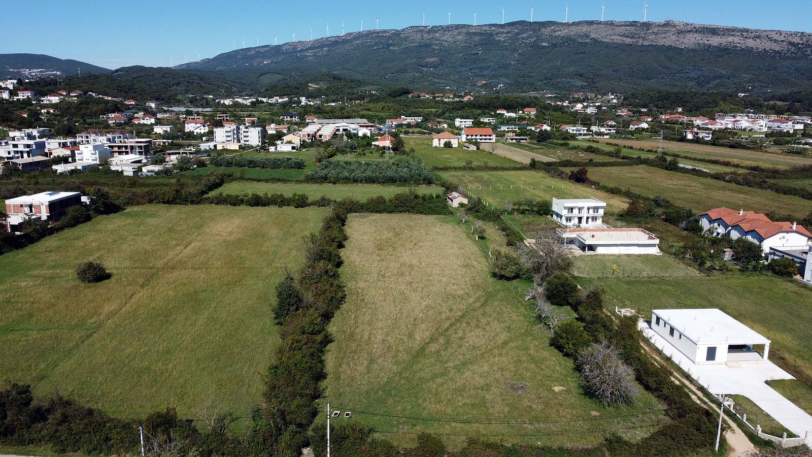 Stunning aerial of Ulcinj, Montenegro&mdash;premium rural properties, fields, homes. Invest with immorenta.me by ekosphere doo.