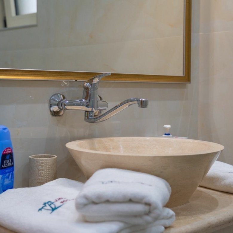 Elegant bathroom in Ulcinj, Montenegro with modern sink and premium finishes&mdash;invest via immorenta.me by Ekosphere Doo.