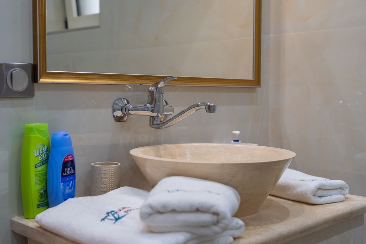 Elegant bathroom in Ulcinj, Montenegro with modern sink and premium finishes&mdash;invest via immorenta.me by Ekosphere Doo.