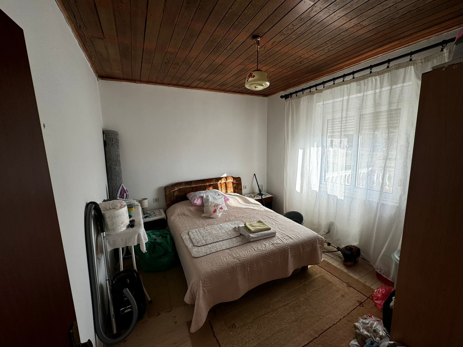 Spacious Ulcinj bedroom with natural light, double bed, premium linens. Invest in Montenegro property with immorenta.me by ekosphere doo.
