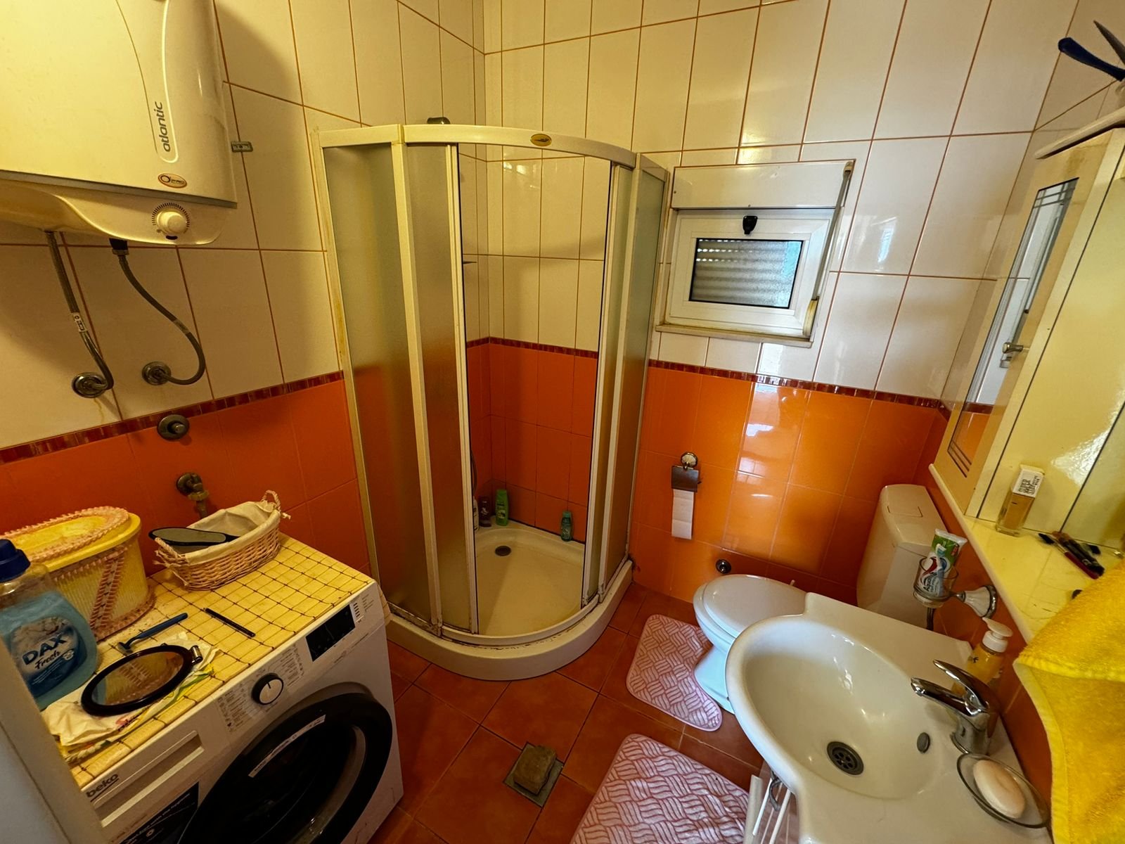 Modern Ulcinj bathroom with vibrant tiling, shower, bidet, washer&mdash;exclusive on immorenta.me by ekosphere doo.