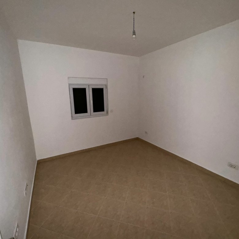 Bright, spacious room in Ulcinj, Montenegro with tiled floor, white walls, double window&mdash;prime investment at immorenta.me by ekosphere doo.