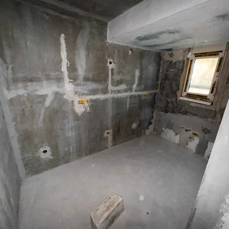 Spacious unfinished concrete room with utility points, large window, and investment potential in Ulcinj&mdash;exclusive at immorenta.me by Ekosphere doo.