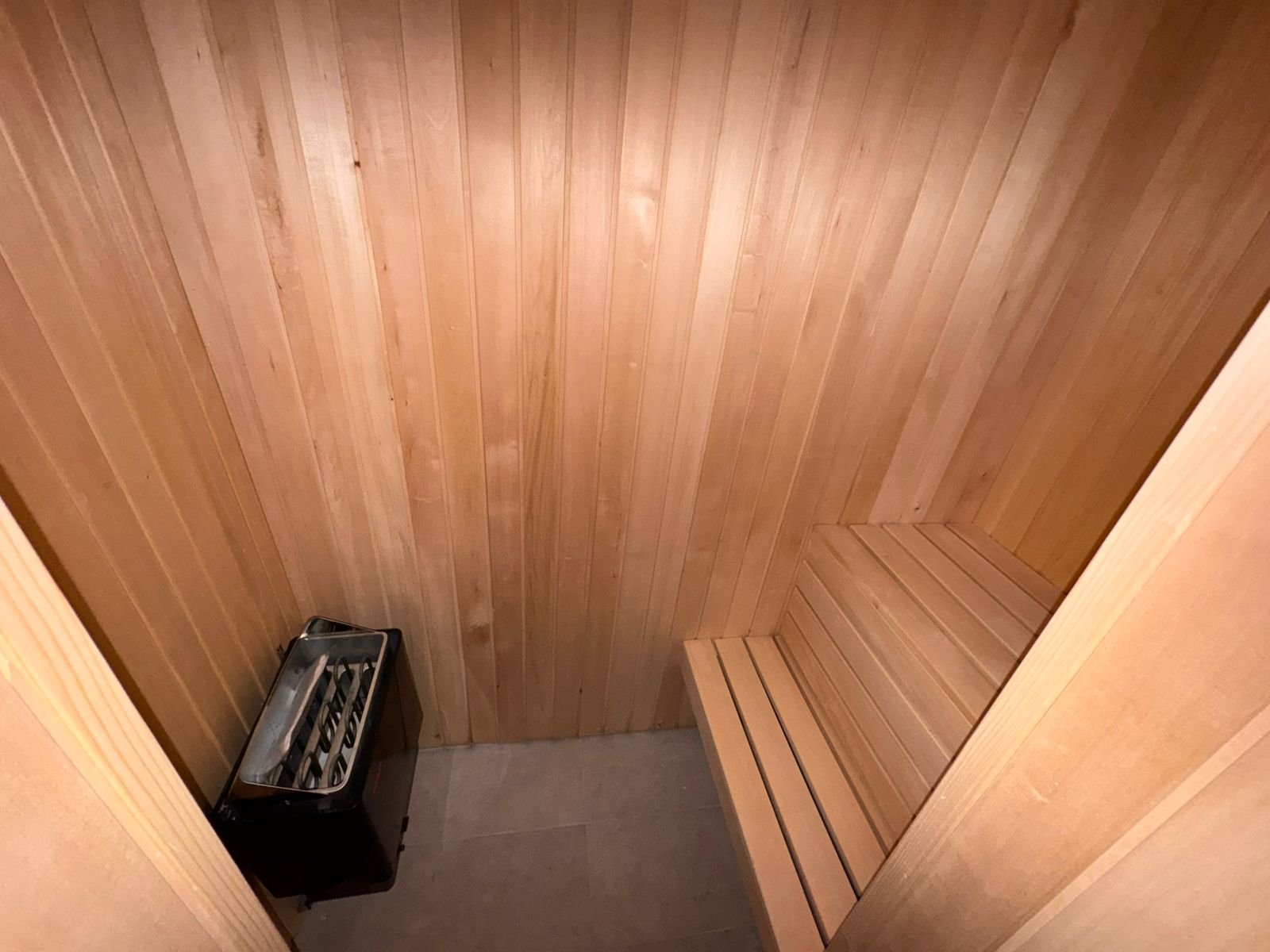 Modern light-wood sauna with bench and premium heater&mdash;exclusive wellness asset for Ulcinj real estate by immorenta.me, Ekosphere DOO.