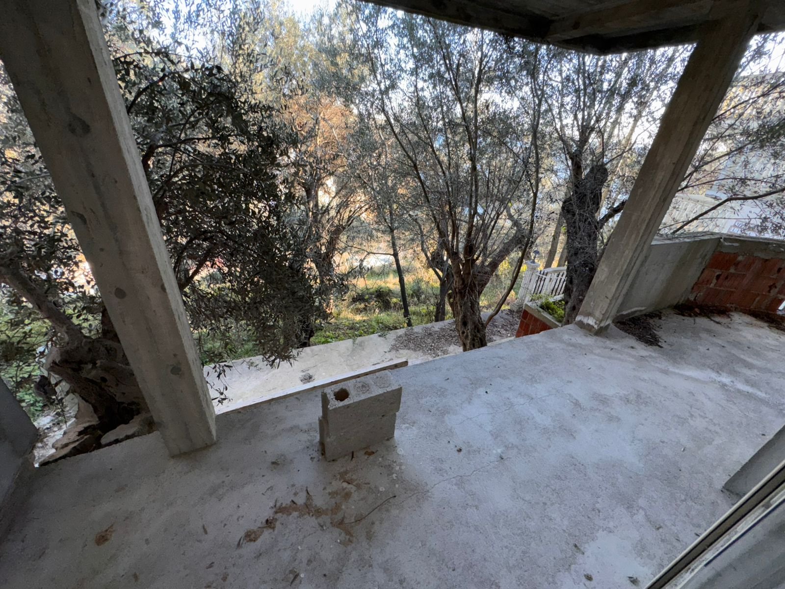 Under-construction balcony with scenic woodland views in Ulcinj, Montenegro&mdash;prime investment from ekosphere doo on immorenta.me.