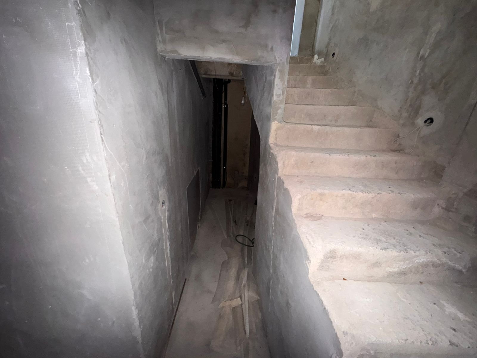 Unfinished concrete staircase and hallway under construction in Ulcinj&mdash;prime real estate investment from Montenegro-Listings by ekosphere doo.