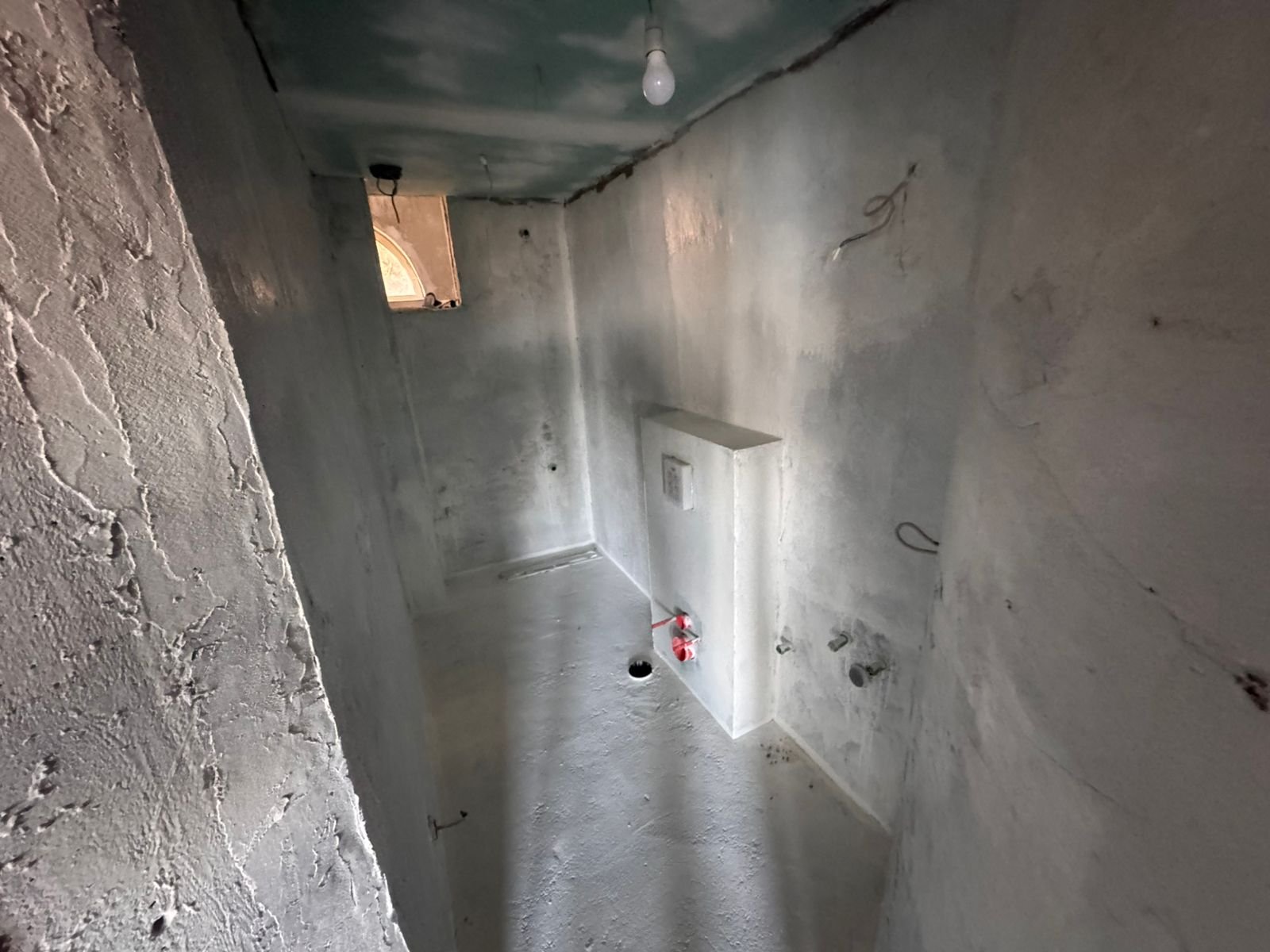 Unfinished room in Ulcinj, Montenegro&mdash;prime investment with concrete walls, plumbing, window; custom-build your property. Eksosphere doo project.