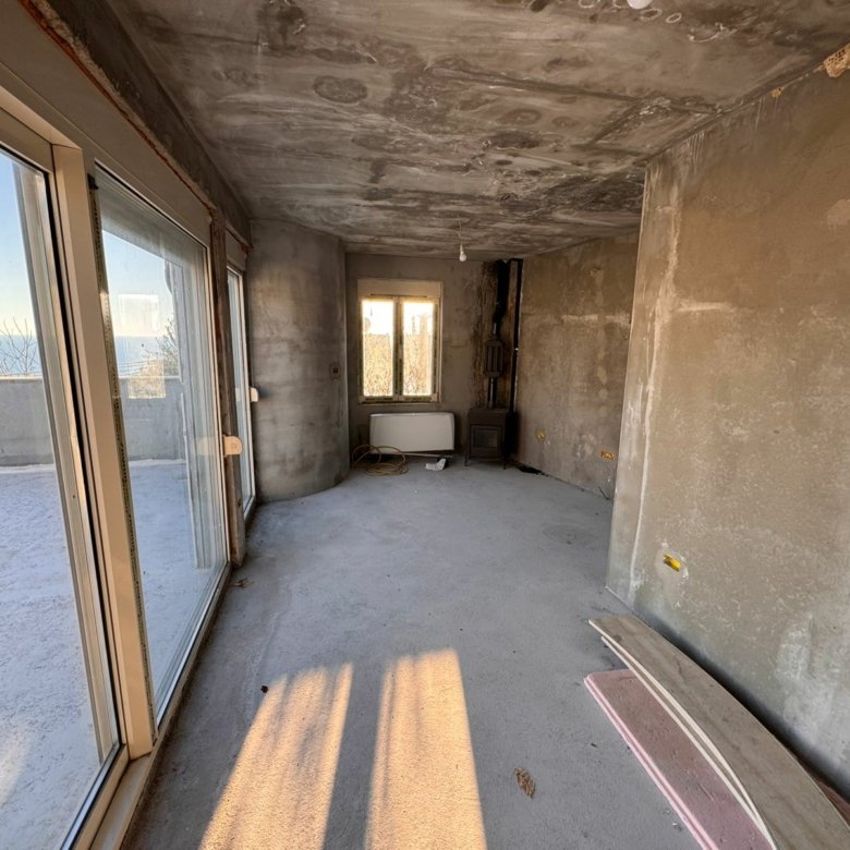 Unfinished Ulcinj property with panoramic balcony views, large windows, and investment potential&mdash;exclusive on immorenta.me by ekosphere doo.