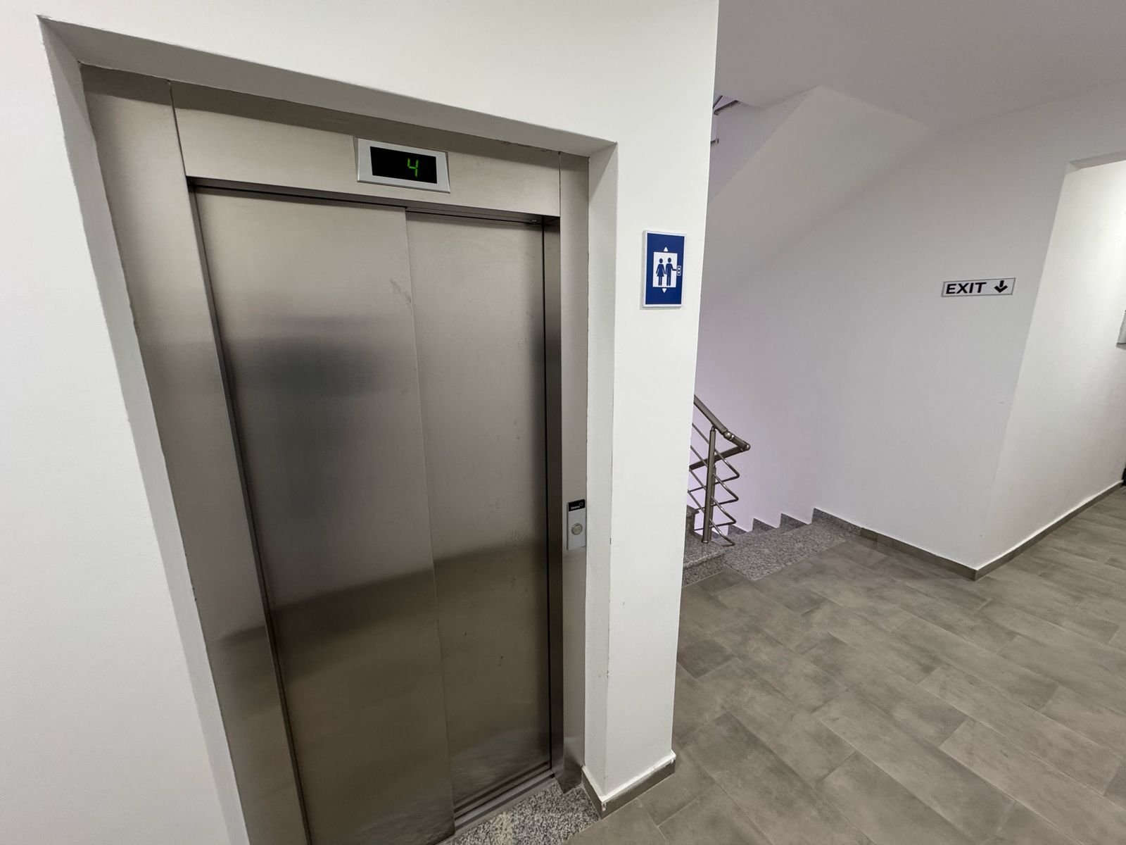 Modern Ulcinj property: closed elevator and sleek stairway, tiled floors, prime real estate&mdash;by ekosphere doo at immorenta.me.