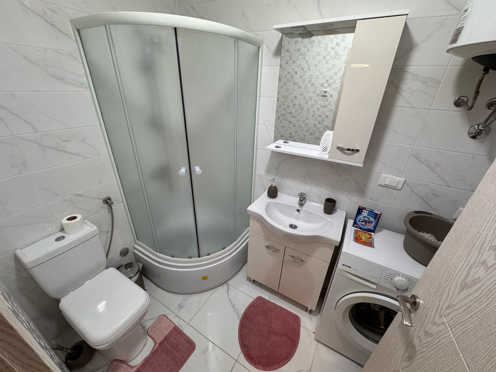 Modern Ulcinj bathroom: corner shower, stylish fixtures, washer, water heater&mdash;ideal investment on immorenta.me (ekosphere doo).