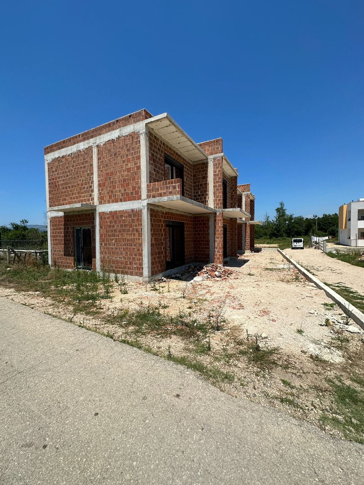 Invest in Ulcinj: Two-story brick property under construction on prime land, listed on immorenta.me by ekosphere doo.