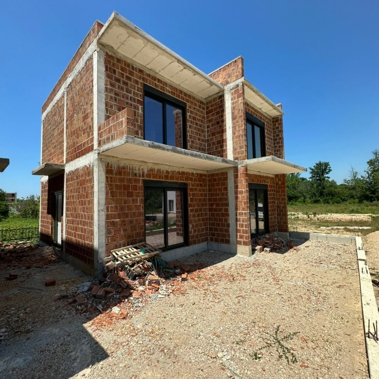 Modern two-story house under construction in Ulcinj, Montenegro&mdash;prime real estate investment from ekosphere doo via immorenta.me.
