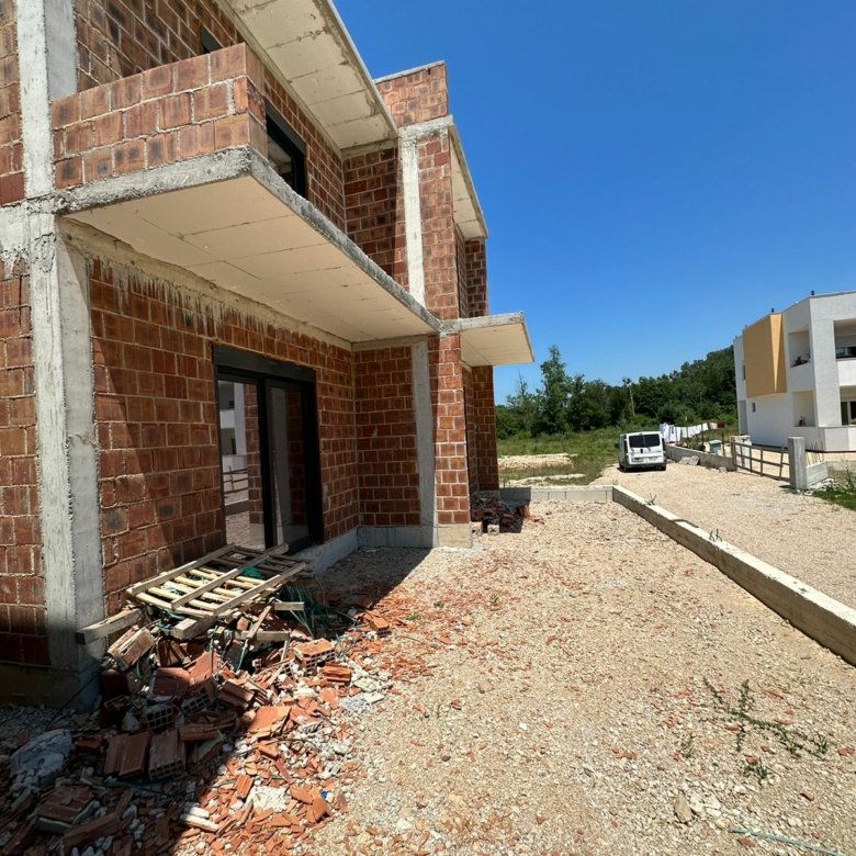 Prime investment opportunity: Partially built brick property in Ulcinj, Montenegro. Clear sky, easy access. Montenegro-listings.me by ekosphere doo.