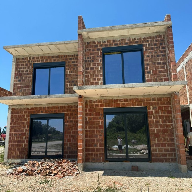 Modern two-story house under construction in Ulcinj, Montenegro&mdash;prime investment. Seen on immorenta.me by ekosphere doo.