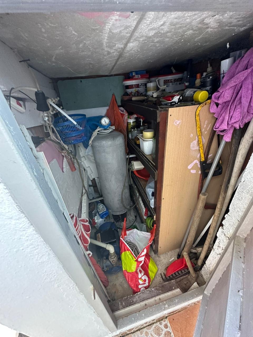 Organized storage room in Ulcinj, Montenegro&mdash;ample shelving, tools, cleaning supplies. Exclusive investment at immorenta.me by ekosphere doo.