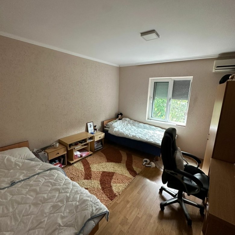 Modern Ulcinj bedroom with twin beds, desk, greenery views&mdash;perfect real estate investment via immorenta.me by ekosphere doo.