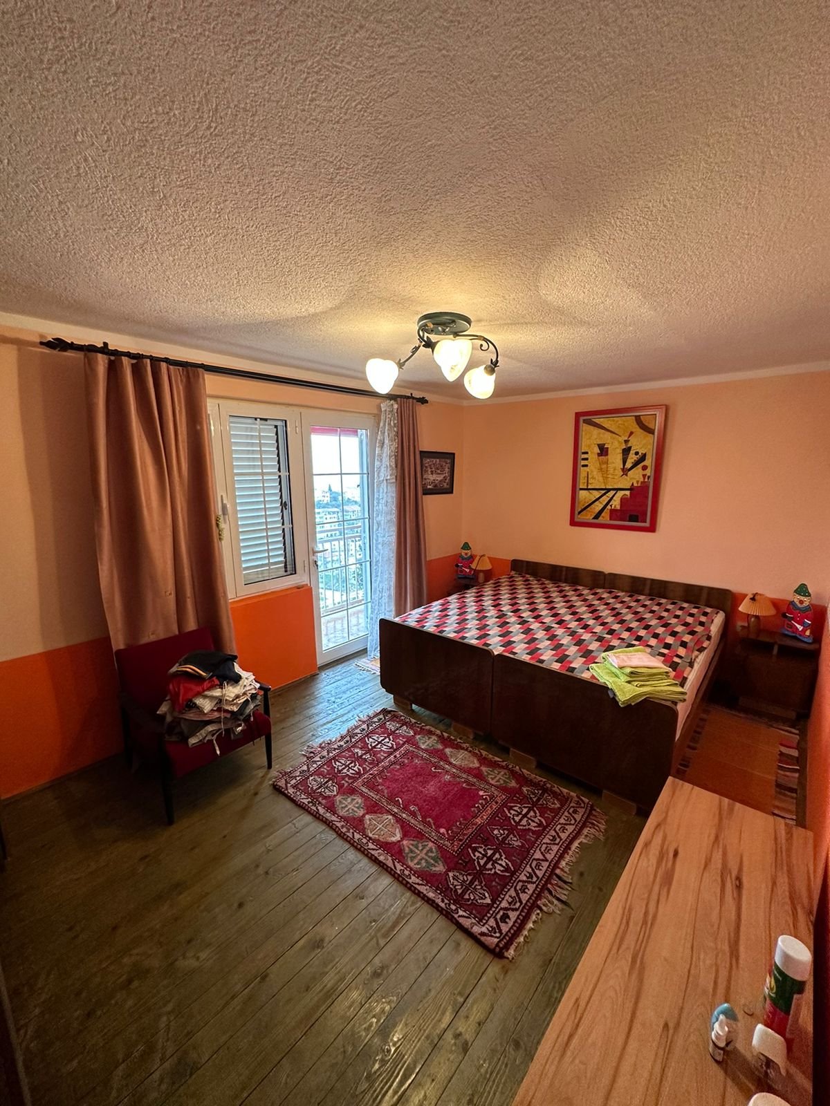 Spacious Ulcinj bedroom with double bed, balcony, stylish decor&mdash;prime Montenegro real estate via immorenta.me by ekosphere doo.