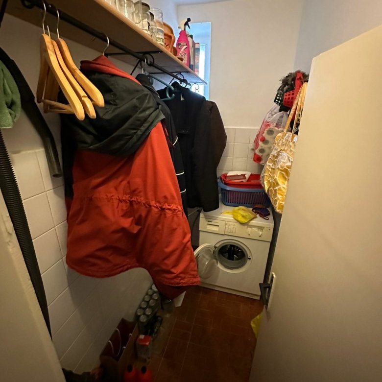 Efficient Ulcinj laundry room with washer, storage, and tiled finishes. Invest in Montenegro real estate via immorenta.me by ekosphere doo.