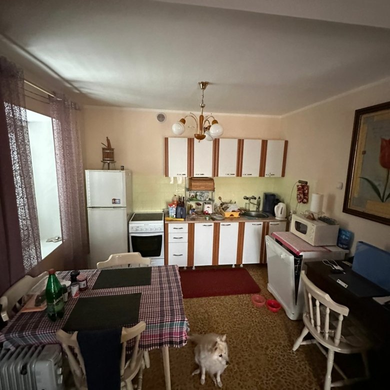 Modern kitchen in Ulcinj: white cabinets, appliances, dining area. Pet-friendly. Ideal investment&mdash;exclusive at immorenta.me (ekosphere doo).