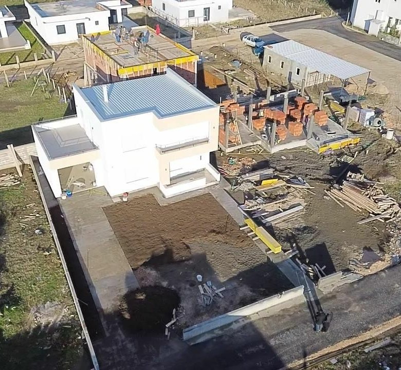 Exclusive aerial view of prime Ulcinj, Montenegro real estate&mdash;new homes rising near completed properties; invest with immorenta.me by Ekosphere doo.