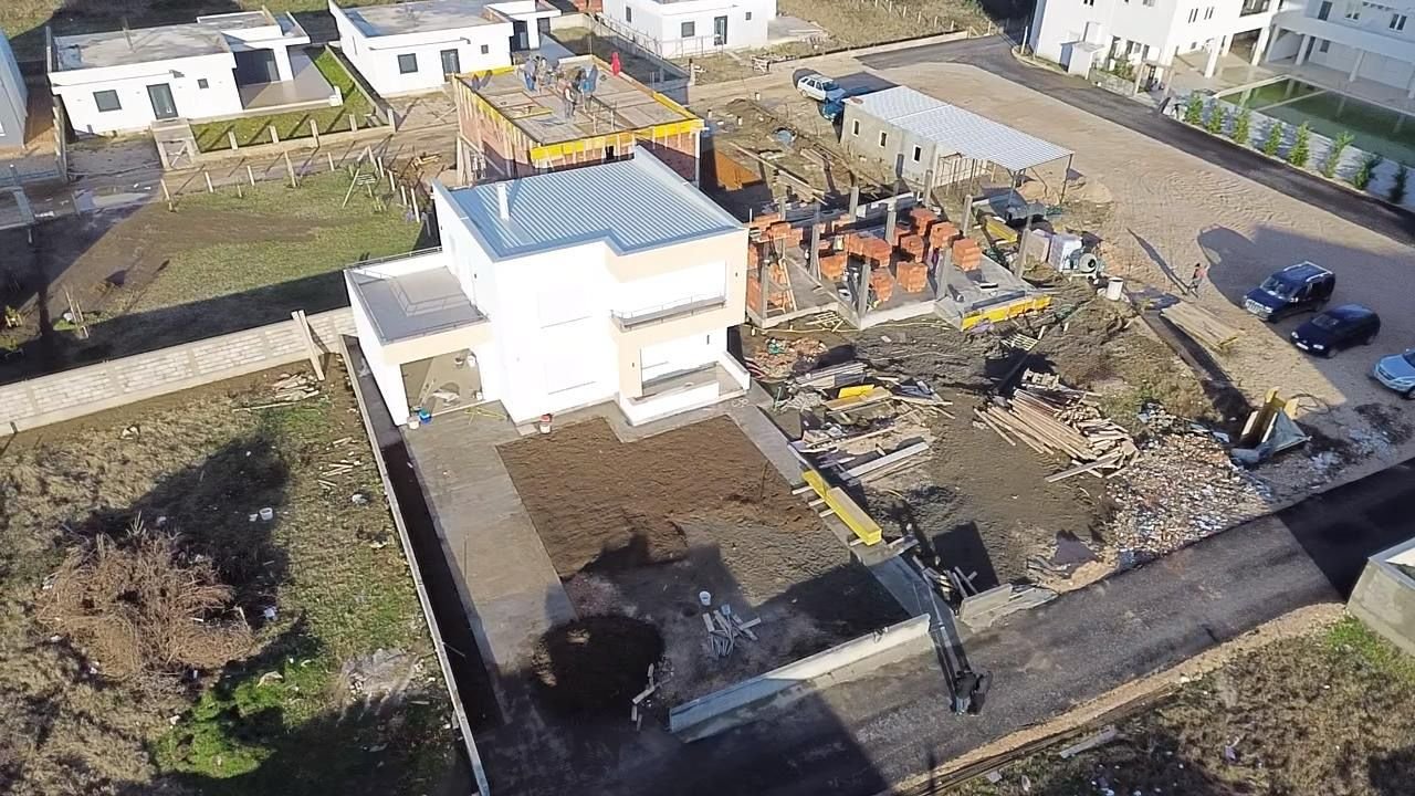 Exclusive aerial view of prime Ulcinj, Montenegro real estate&mdash;new homes rising near completed properties; invest with immorenta.me by Ekosphere doo.