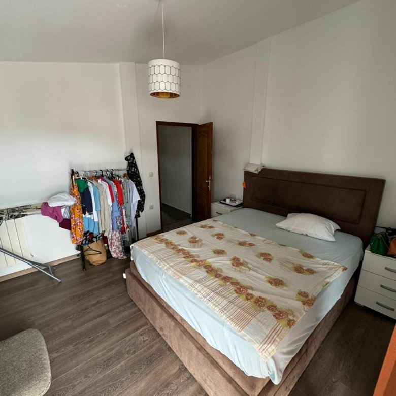 Charming Ulcinj bedroom with double bed, modern storage, and natural light&mdash;prime Montenegro investment. eksophere doo project.