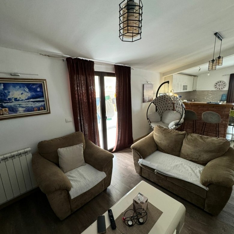 Modern Ulcinj apartment with stylish living room, sleek kitchen, designer decor&mdash;top investment on immorenta.me by ekosphere doo.