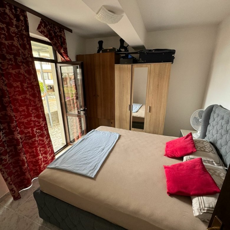 Discover this cozy Ulcinj bedroom with outdoor access, mirrored wardrobe, and stylish finishes&mdash;exclusive at immorenta.me by ekosphere doo.