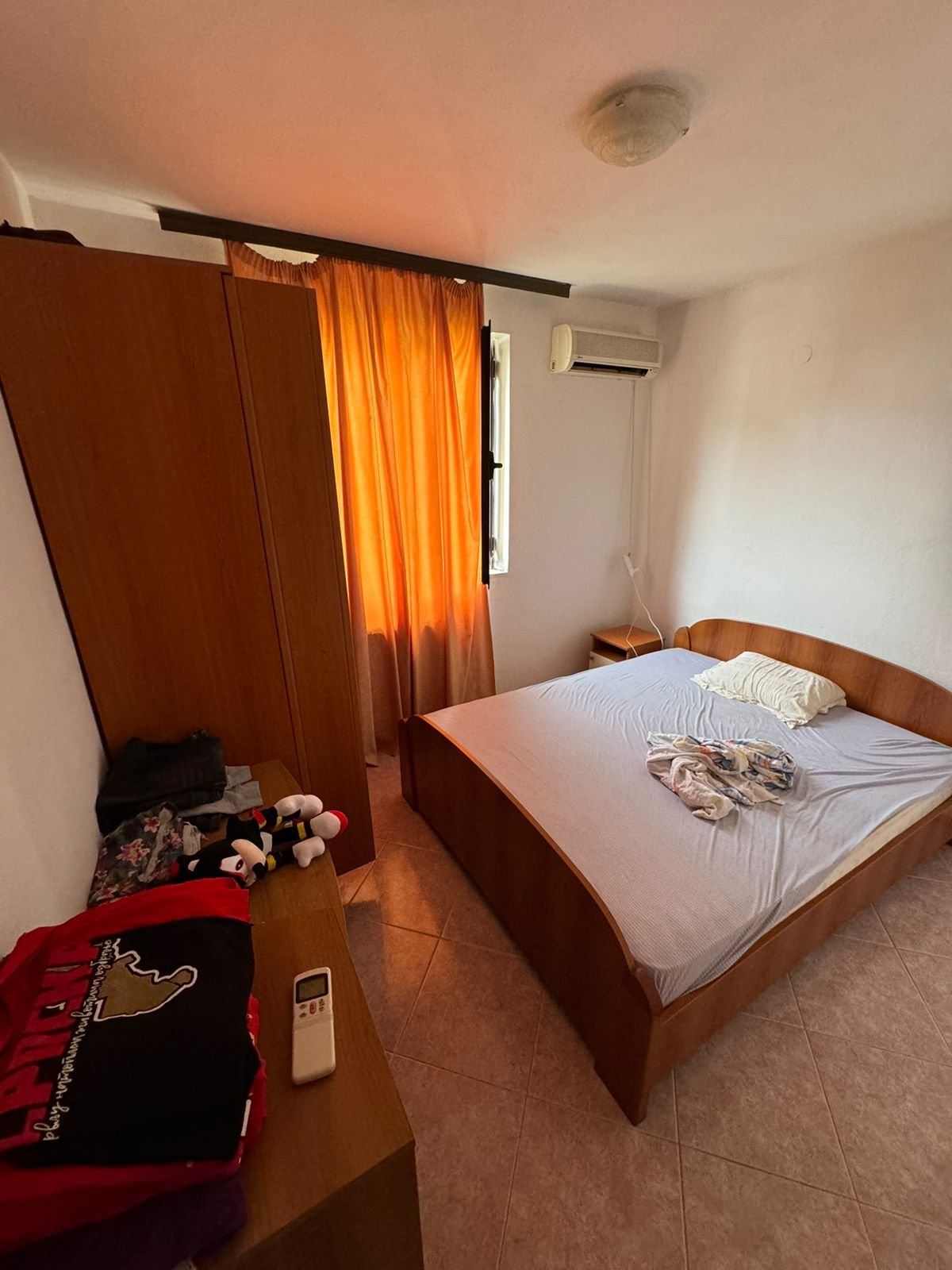 Charming Ulcinj bedroom with wooden double bed, wardrobe, AC&mdash;perfect cozy Montenegro property from ekosphere doo via immorenta.me.