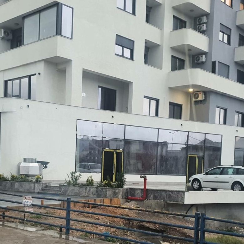 Contemporary gray and white property for sale in Ulcinj, Montenegro&mdash;spacious windows, investment-ready, by ekosphere doo.