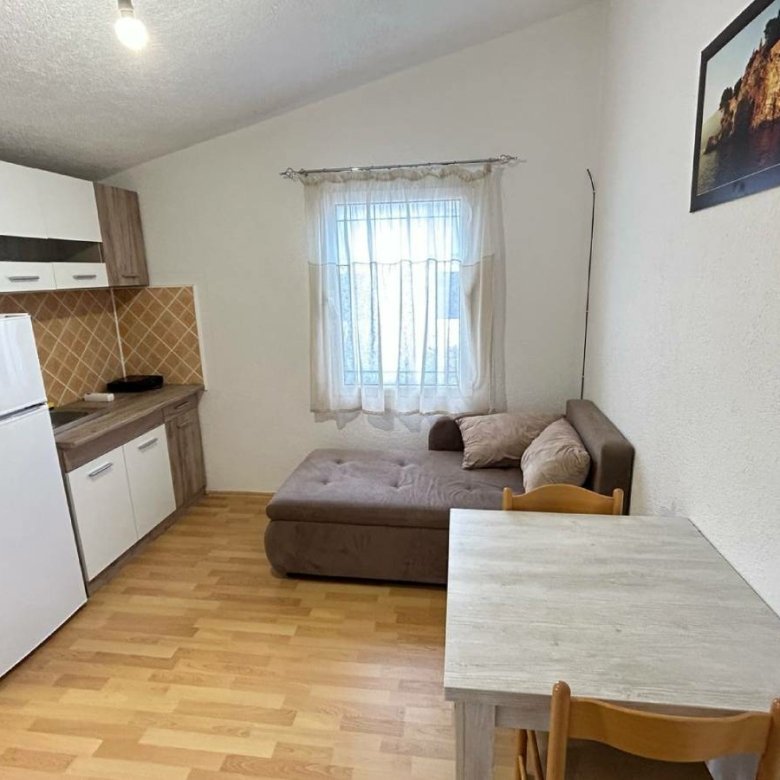 Bright kitchen-living space with wood floors, quality furnishings in Ulcinj&mdash;prime investment from immorenta.me by Ekosphere.