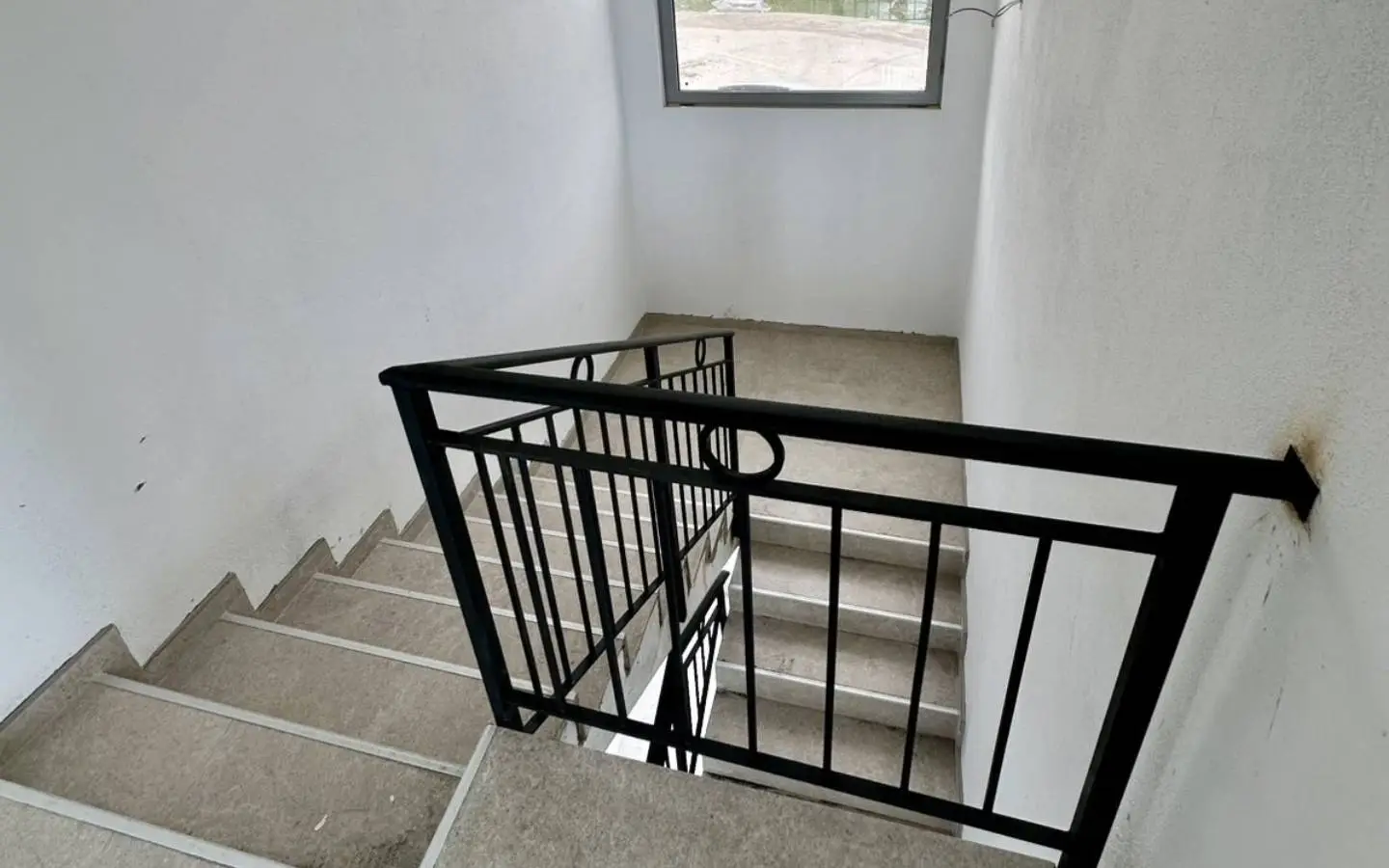 Modern concrete staircase with metal railings in Ulcinj property; investment potential&acirc;exclusive at Montenegro-Listings.me, by Ekosphere DOO.