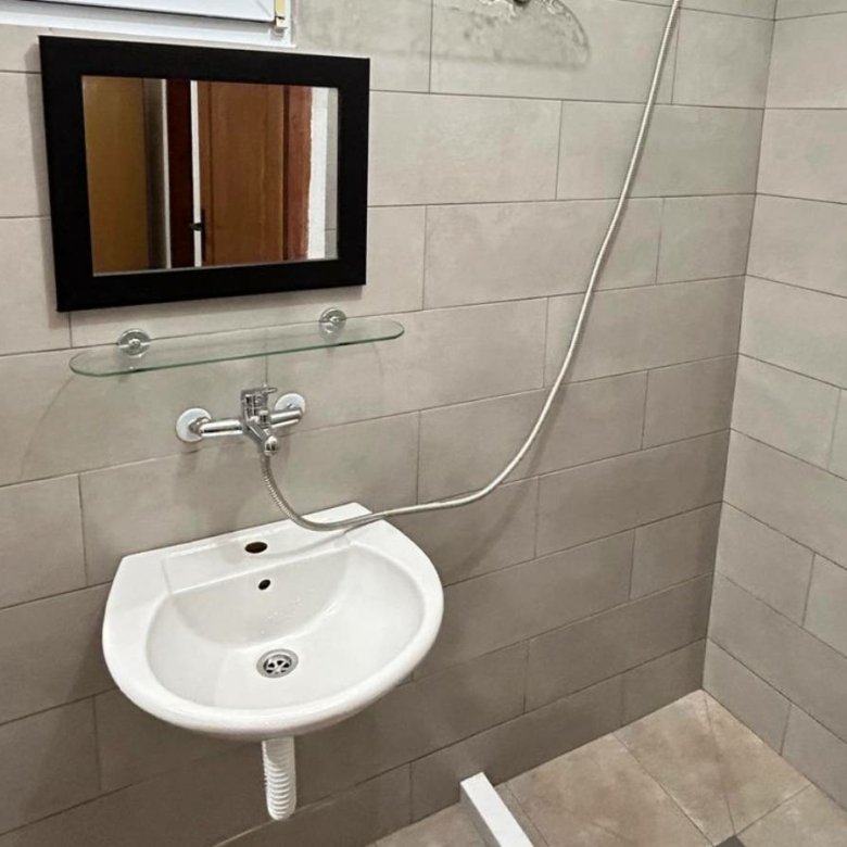 Elegant Ulcinj bathroom with modern fixtures, beige tile, and stylish details&mdash;exclusive on immorenta.me by Ekosphere doo.