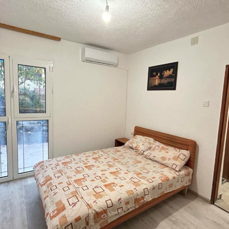 Charming Ulcinj bedroom with double bed, wardrobe, AC, en suite bath&mdash;ideal investment. Montenegro-listings.me by ekosphere doo.