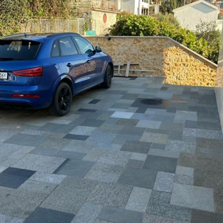Modern Ulcinj property with EV charger, tiled drive, luxury SUV, greenery&mdash;exclusive from Ekosphere Montenegro-Listings.me.