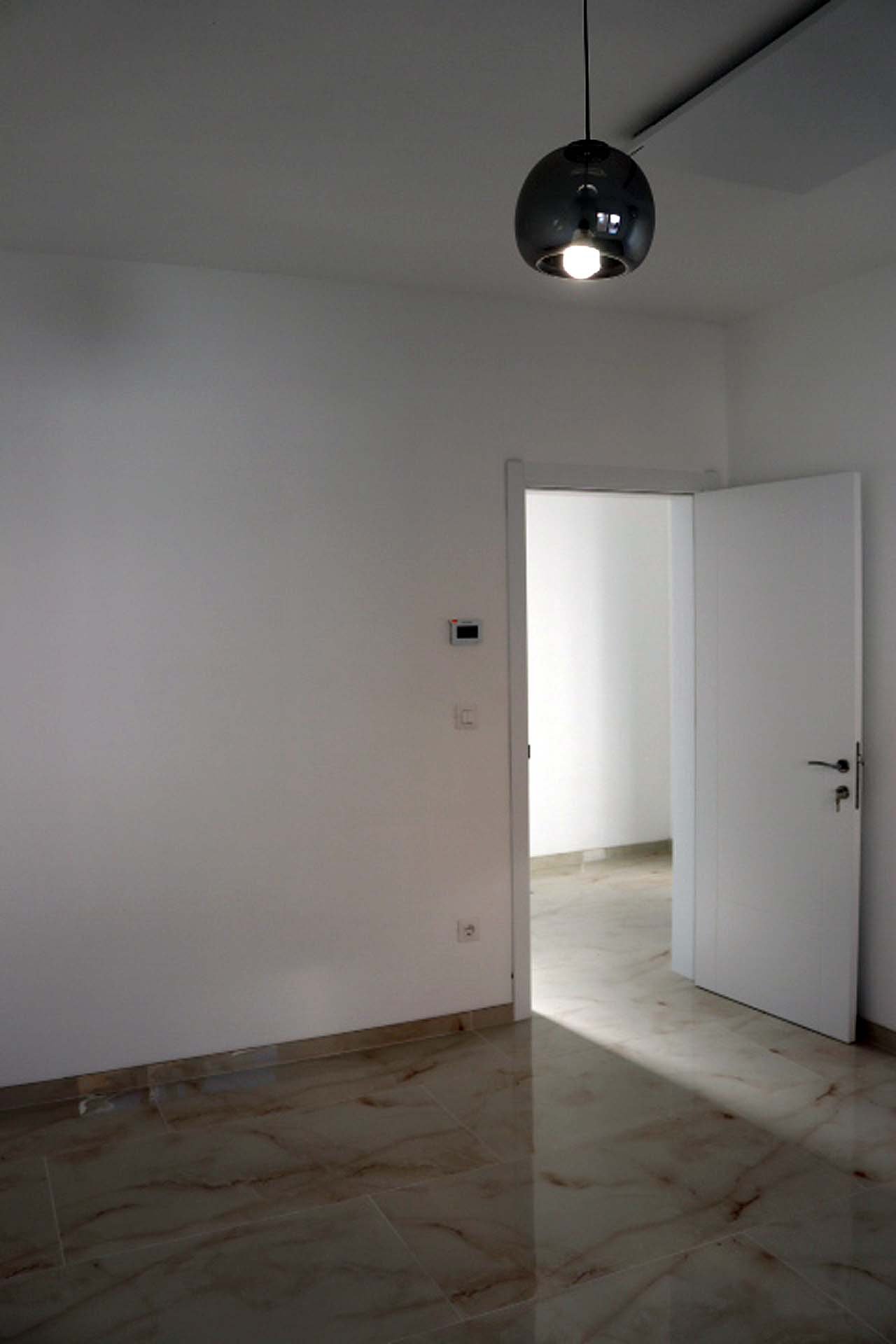 Bright, modern Adana Villa room in Ulcinj with marble floors and natural light. Invest via immorenta.me by ekosphere doo.