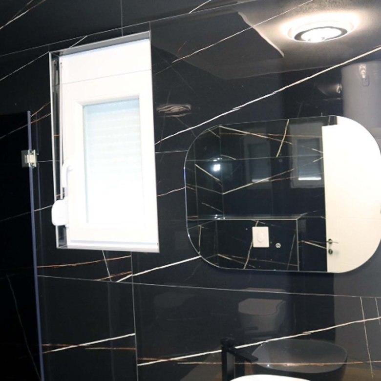 Luxurious Adana Villa bathroom in Ulcinj, Montenegro: marble walls, vessel sink, designer fixtures. immorenta.me by ekosphere doo.