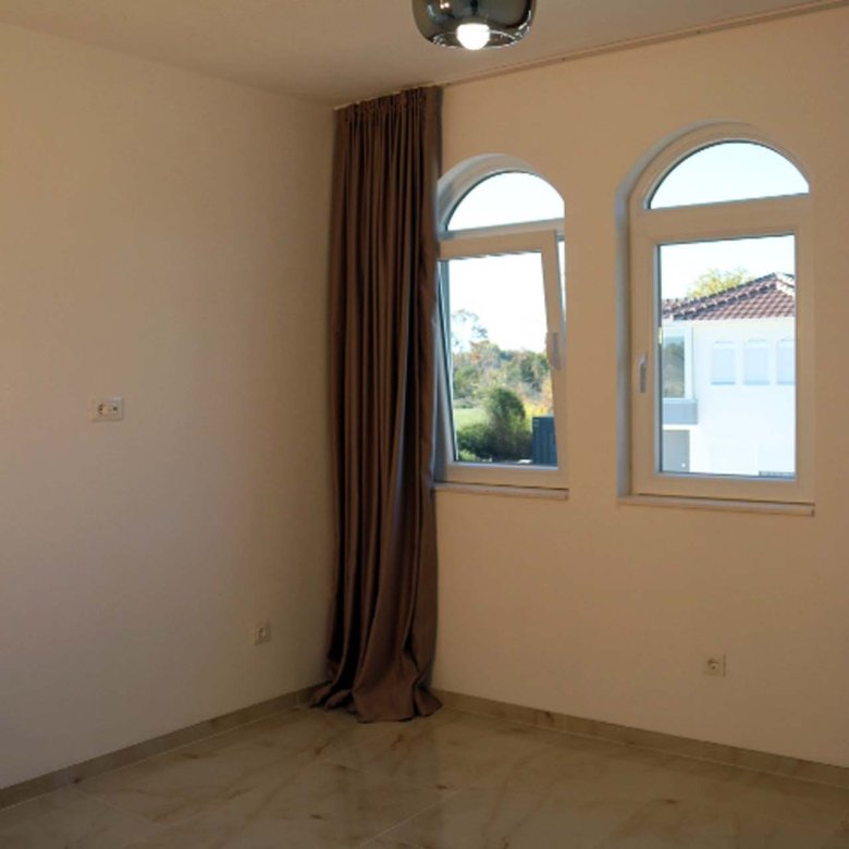 Modern Adana Villa room in Ulcinj, Montenegro: marble floors, arched windows&mdash;prime investment via immorenta.me by ekosphere doo.