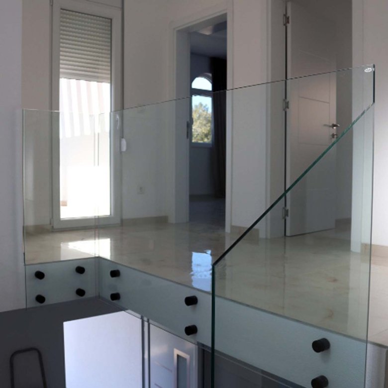 Experience luxury living in this sun-filled Adana Villa landing with glass railings, perfect for property investment in Ulcinj Montenegro.