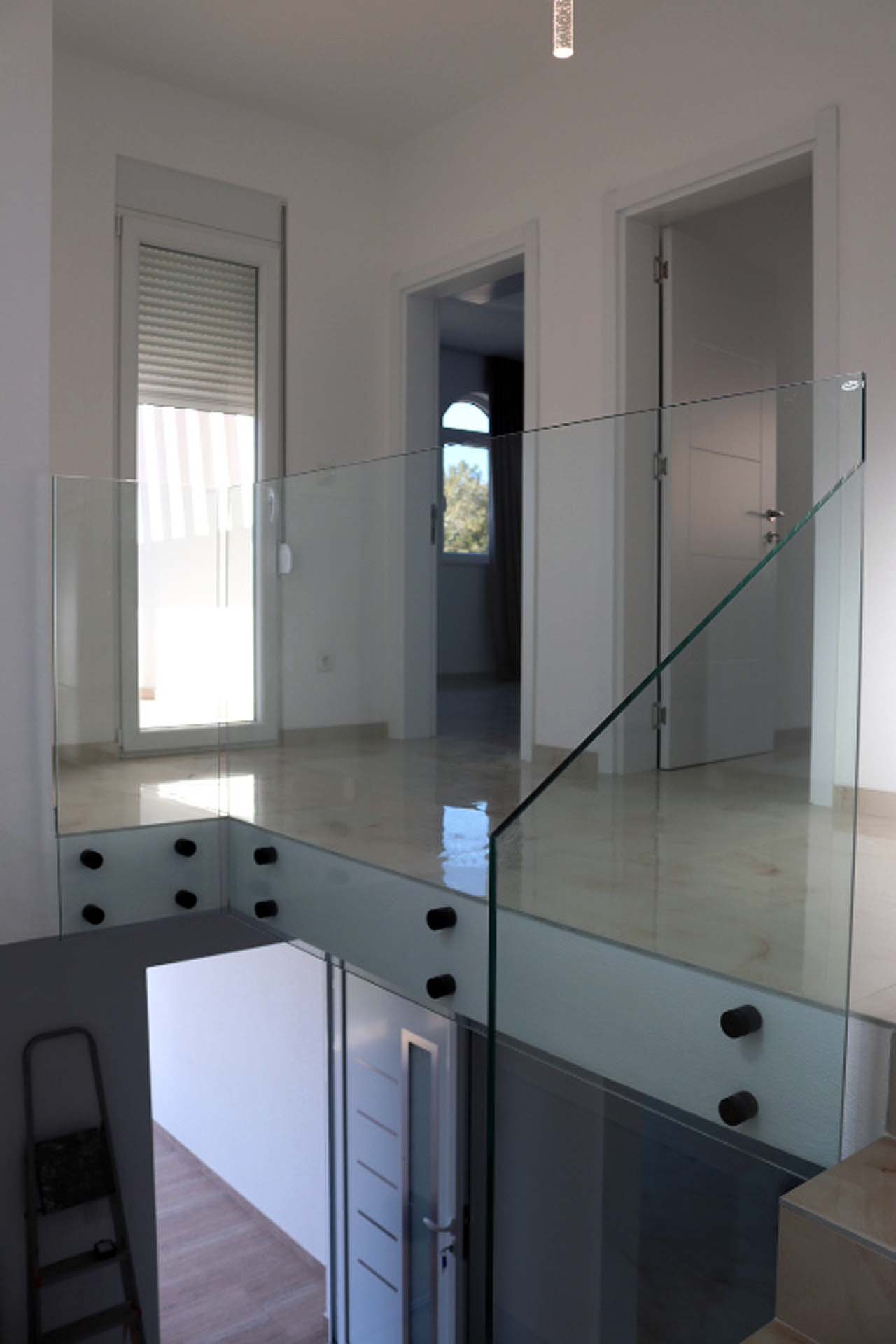 Experience luxury living in this sun-filled Adana Villa landing with glass railings, perfect for property investment in Ulcinj Montenegro.