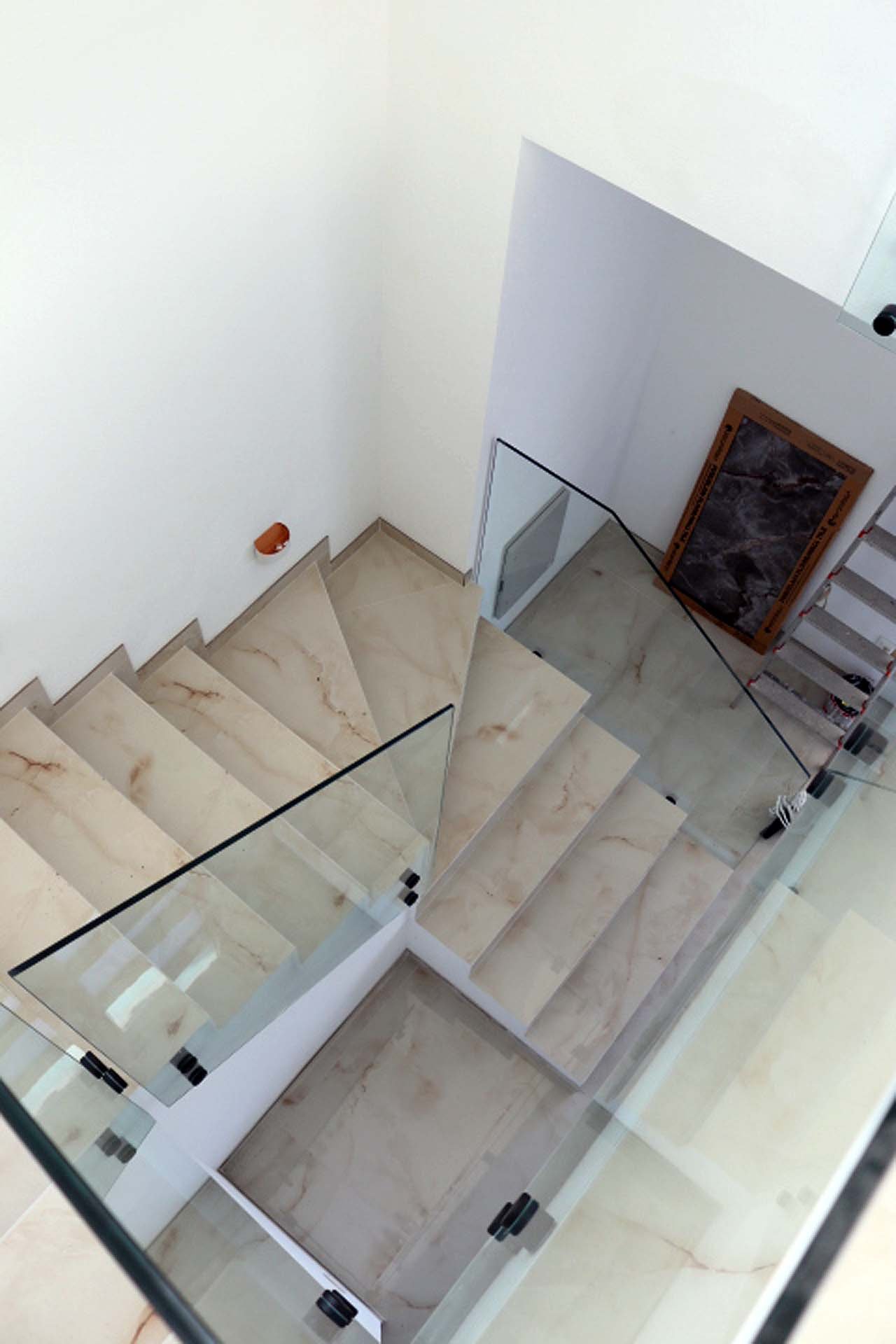 Elegant marble staircase with glass railings in Adana Villa, Ulcinj&mdash;exclusive listing on immorenta.me by ekosphere doo.