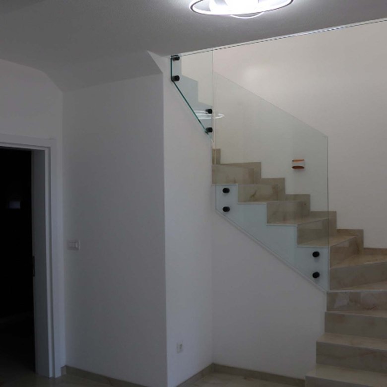 Experience luxury living in Ulcinj with this Adana Villa&mdash;modern staircase, glass railings, and sleek interiors, exclusive on immorenta.me by ekosphere doo.