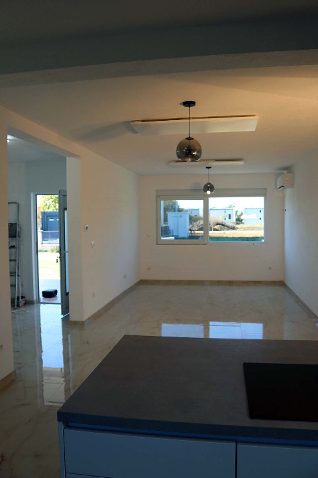 Spacious modern room in Adana Villa, Ulcinj&mdash;large windows, designer tile, open layout. Exclusive at immorenta.me by ekosphere doo.