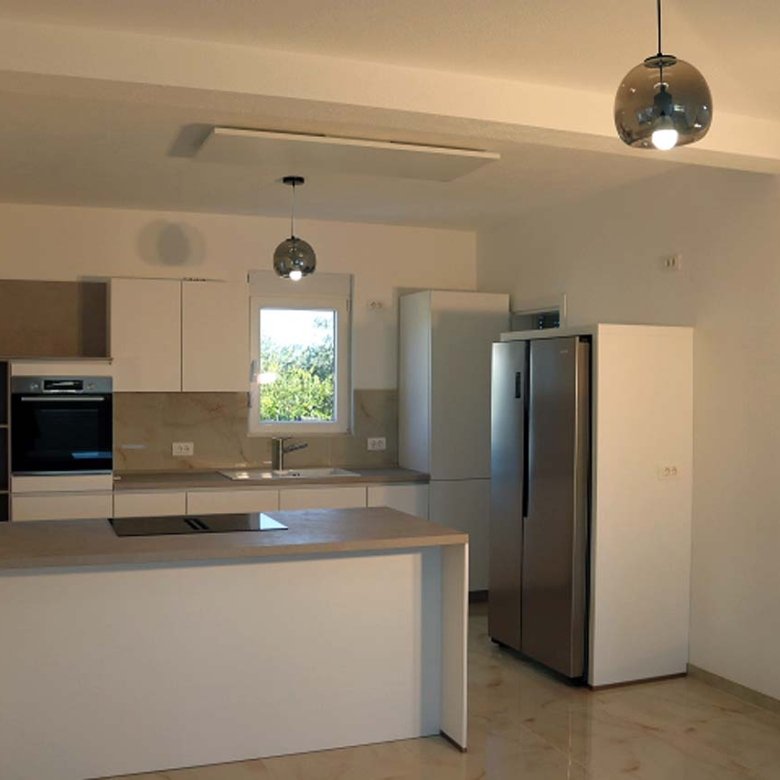 Experience luxury living in Ulcinj with this modern kitchen&mdash;premium appliances, bright interiors, and sleek design. Invest smartly!.