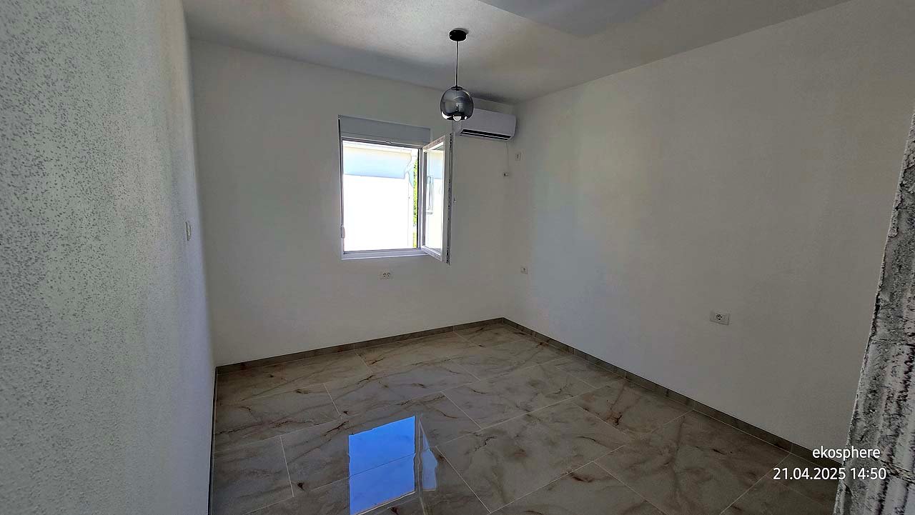 Bright, modern room in Ulcinj with tiled floors, AC, and large window&mdash;ideal property investment via immorenta.me by ekosphere doo.