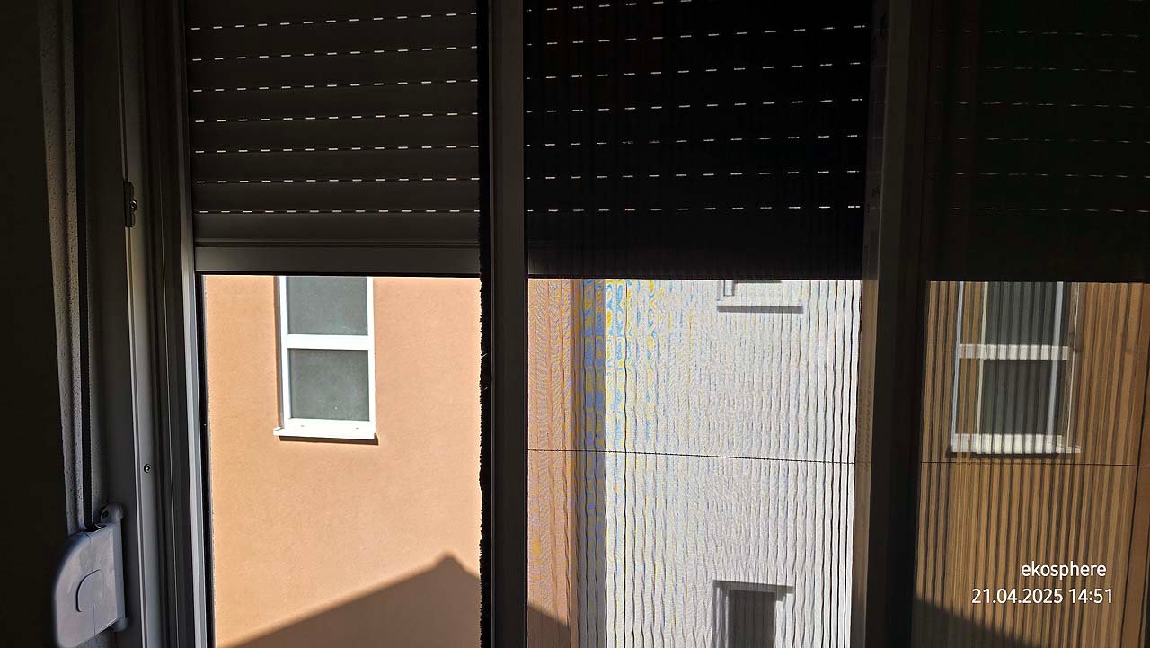 Natural light filters through partially closed shutters, showcasing two premium Ulcinj properties&mdash;ideal for investment on immorenta.me, a project by ekosphere doo.