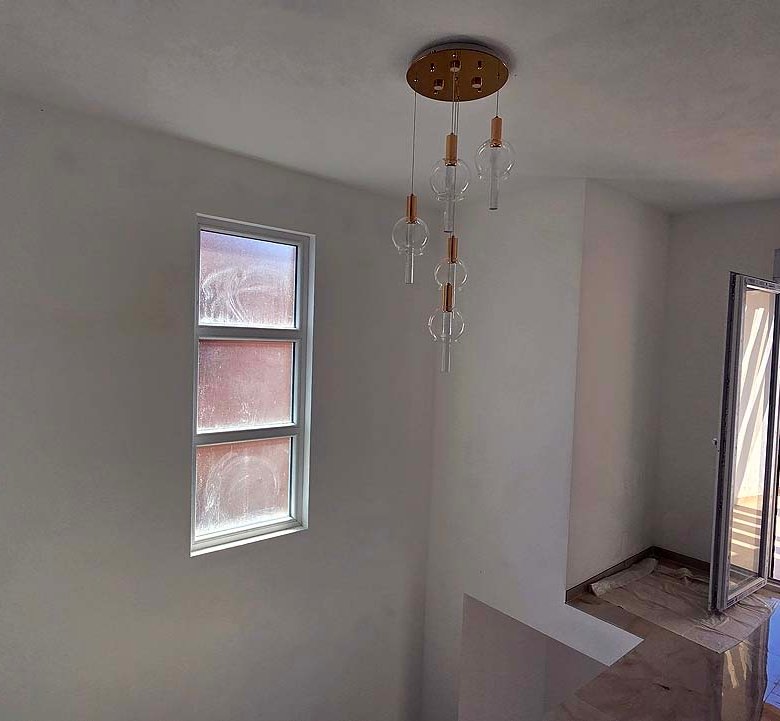 Modern stairwell with white walls, ceiling light, balcony access and Ulcinj views&mdash;ideal property on immorenta.me by ekosphere doo.